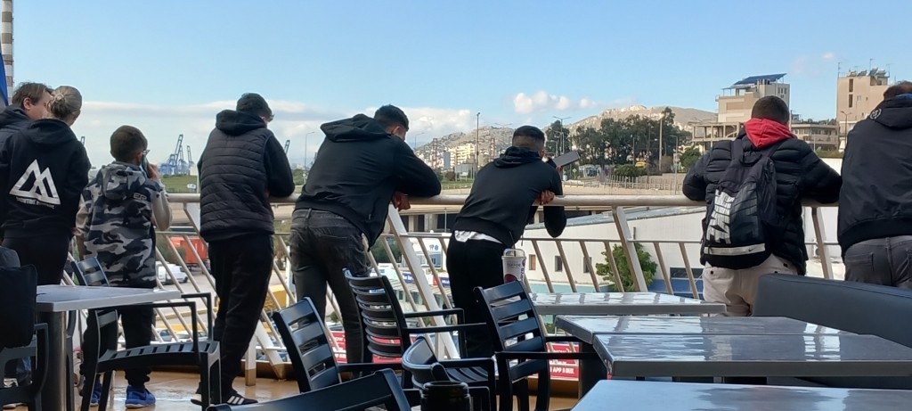Watching lorries revese onto a stationary ship is a boy-bonding thing, apparently.